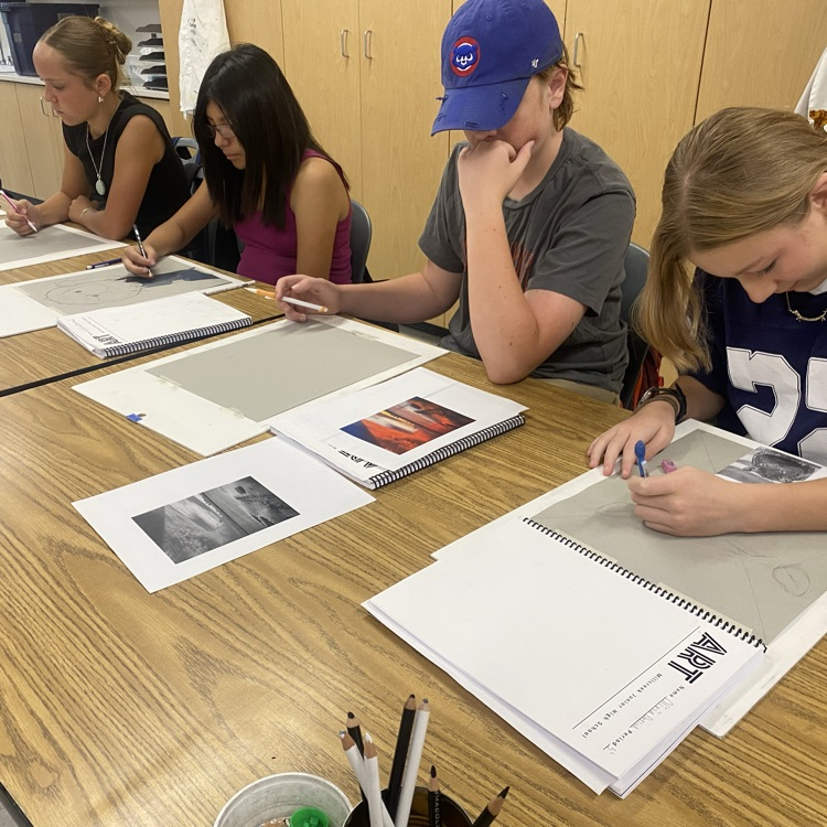 students creating art