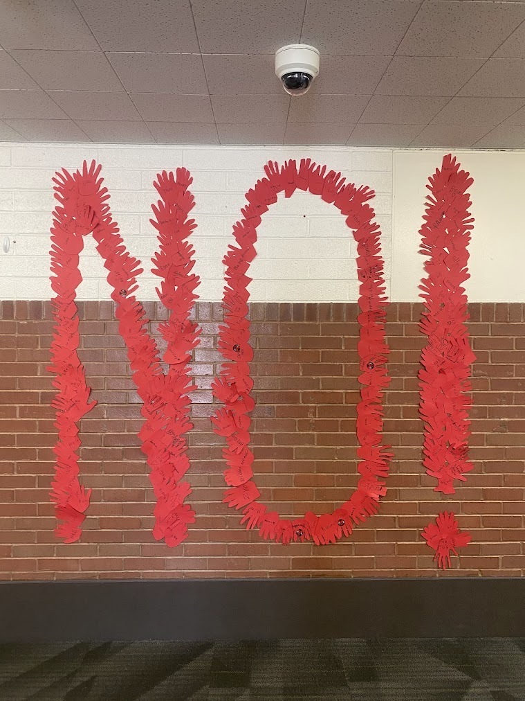 Students participating in a PTA recess activity for Red Ribbon Day