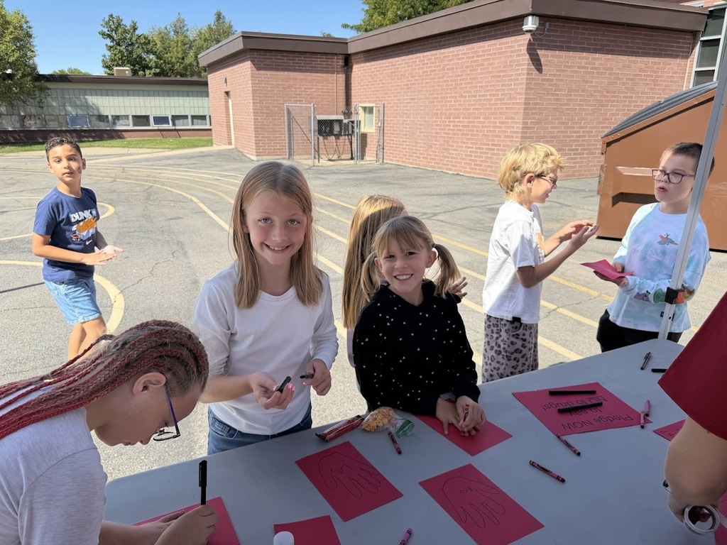 Students participating in a PTA recess activity for Red Ribbon Day