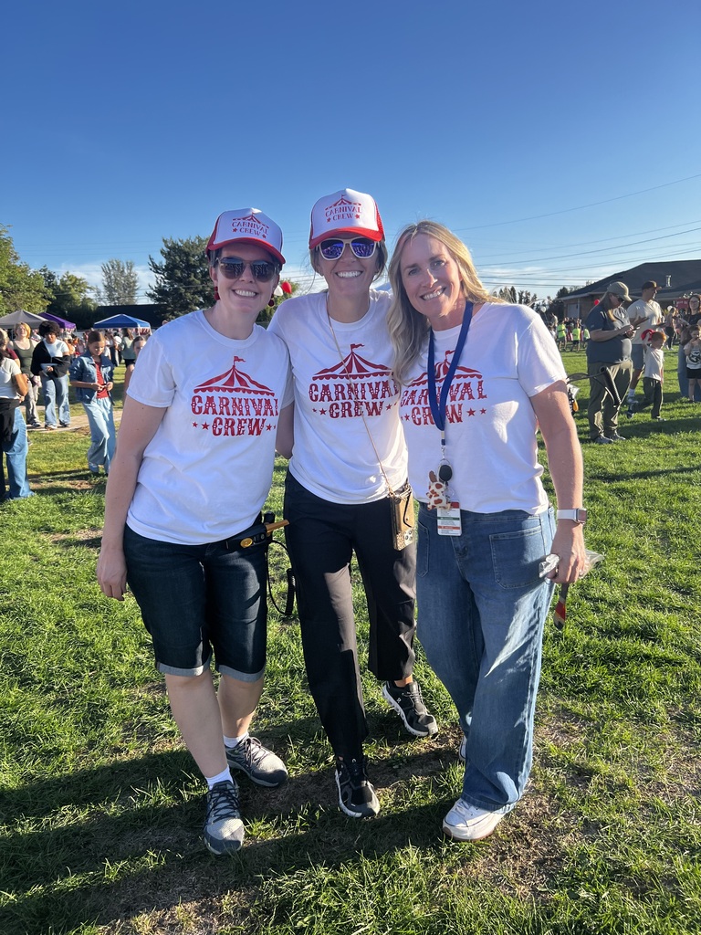 PTO volunteers pose with principal malan