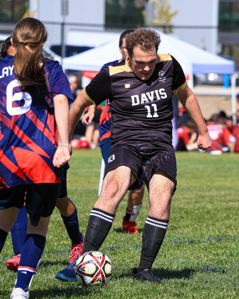 Students playing during a soccer game.