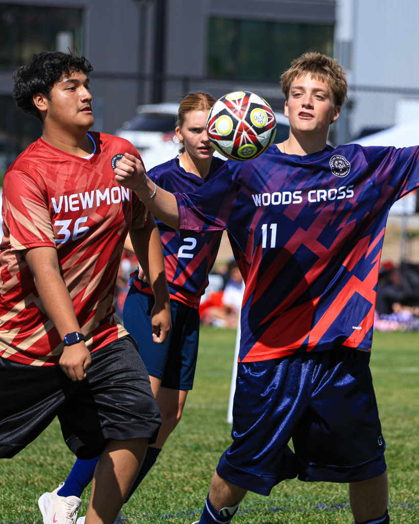 Students playing during a soccer game.