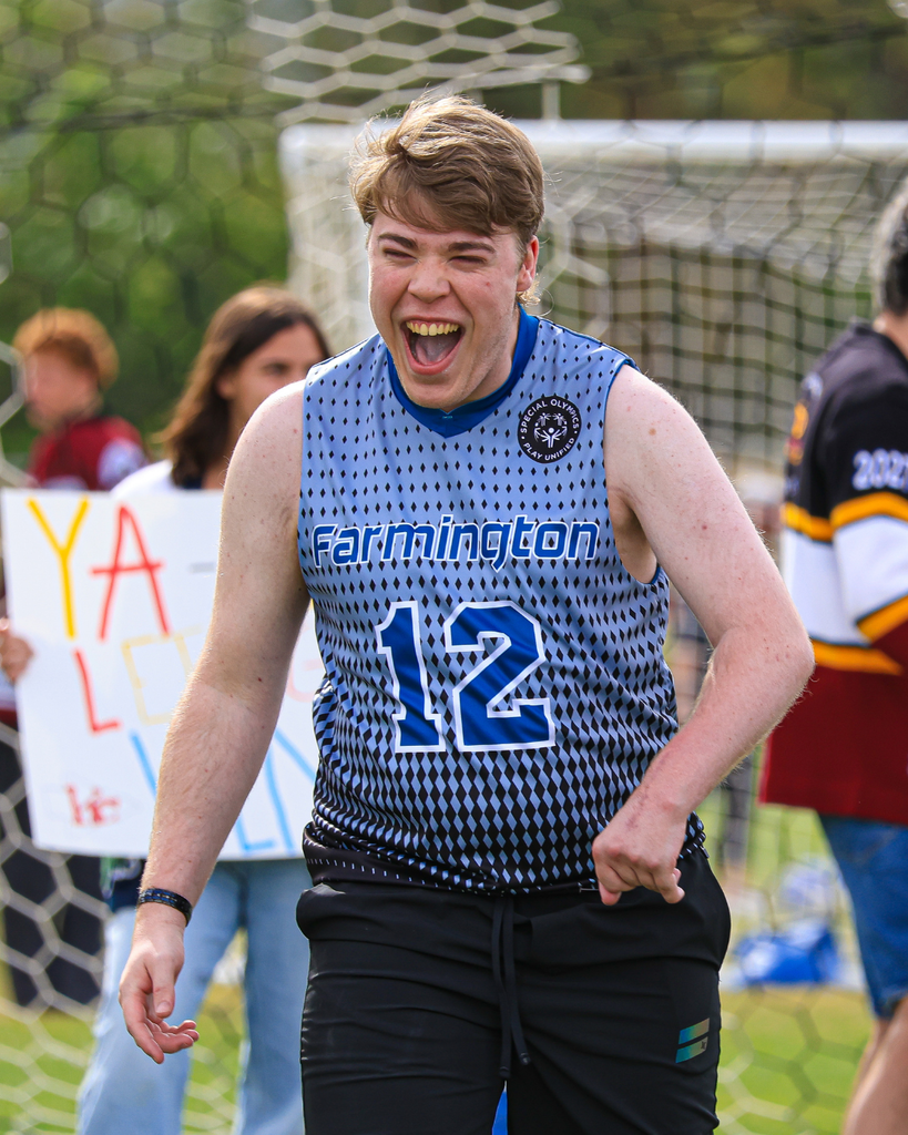 A student celebrates a goal.