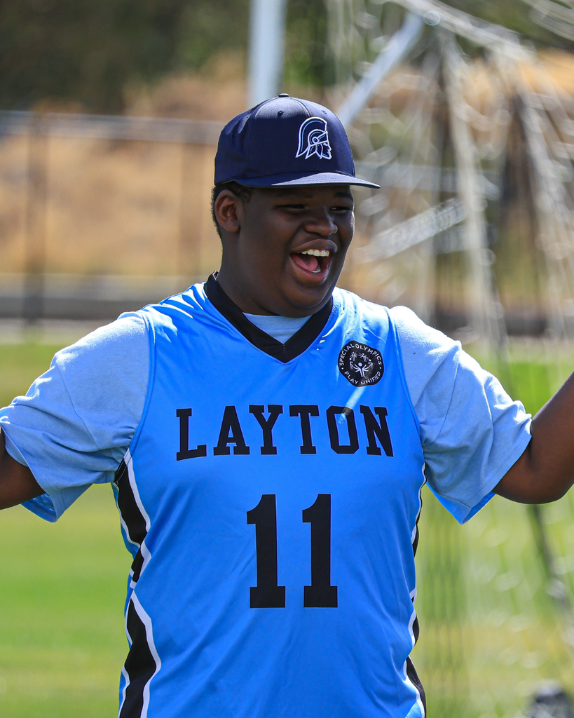 A student celebrates after making a goal.