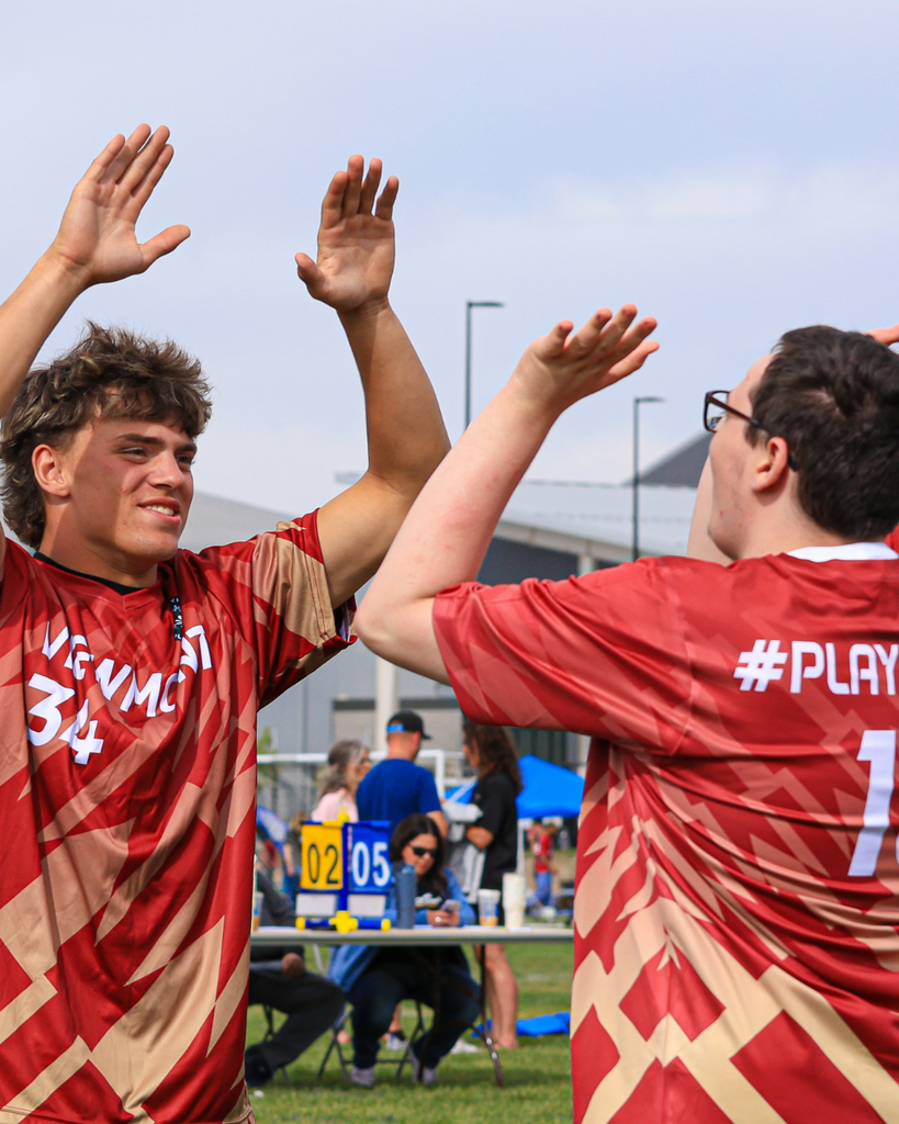 Students celebrating a goal.