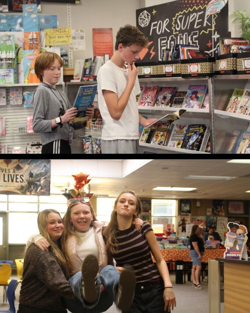 Students stand looking at books during the book fair at North Layton Jr.