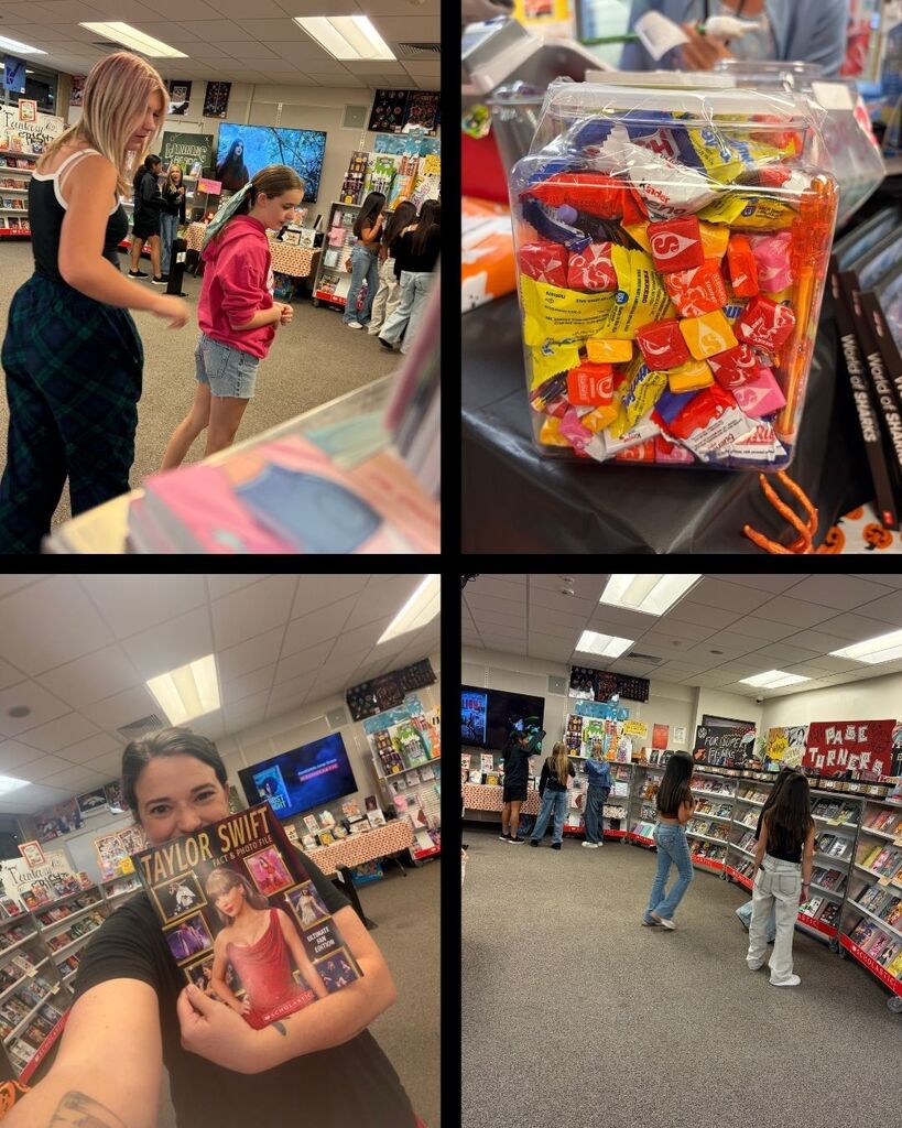 Students looking at books during the book fair