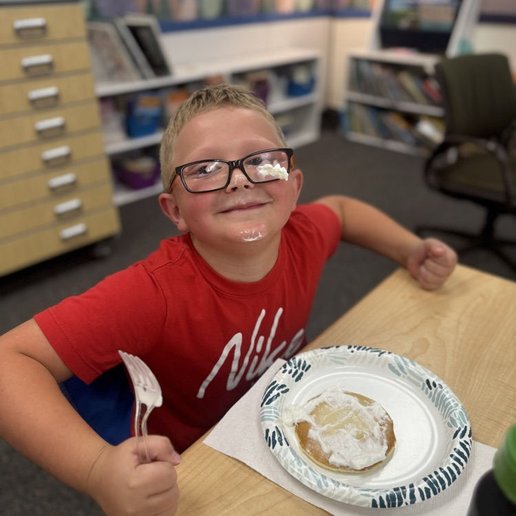 student with pancake