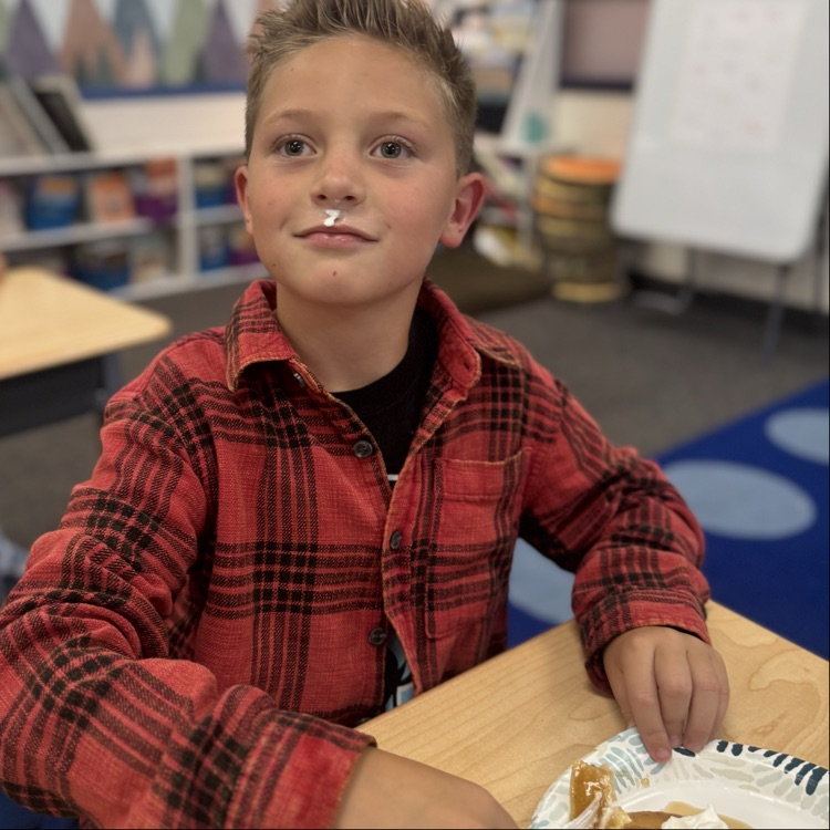 student with pancake