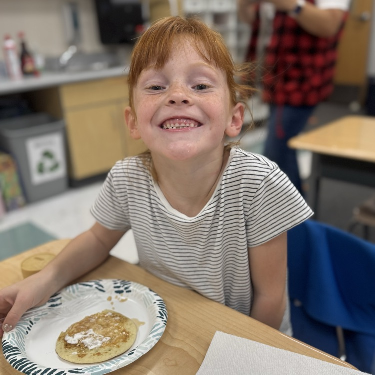 student with pancake