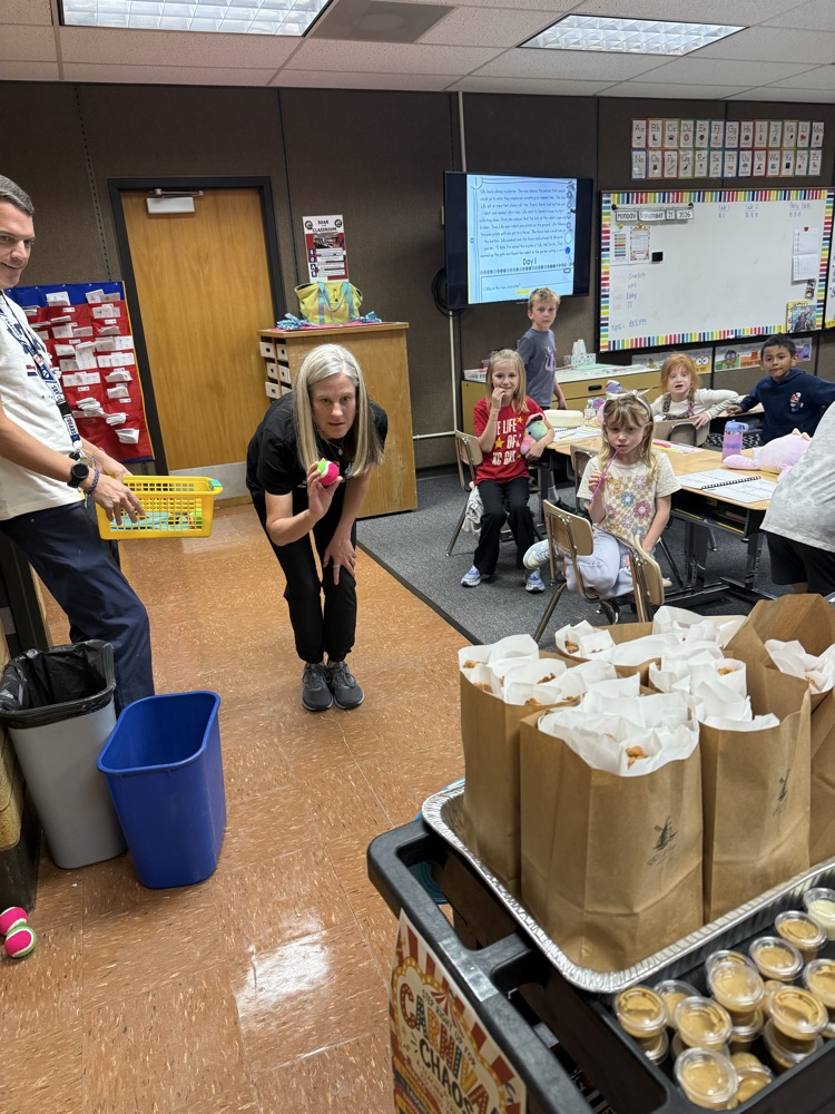 Teachers earned churros and treats playing a fun carnival game with admin!