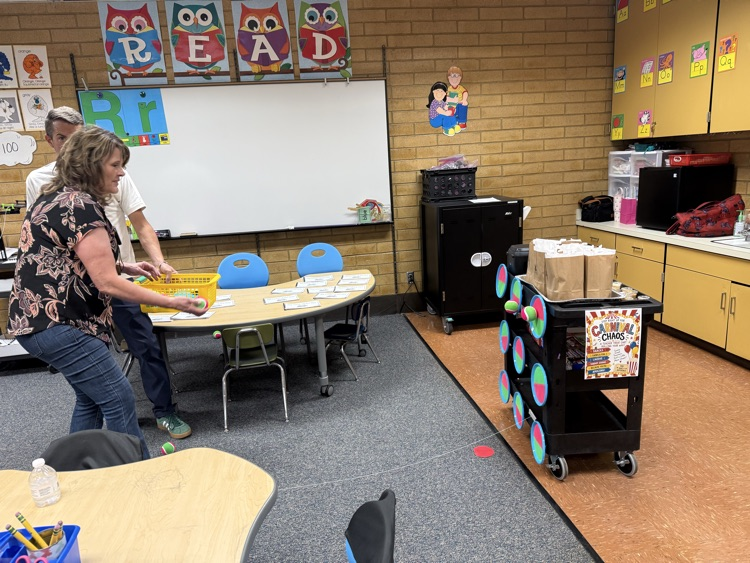 Teachers earned churros and treats playing a fun carnival game with admin!