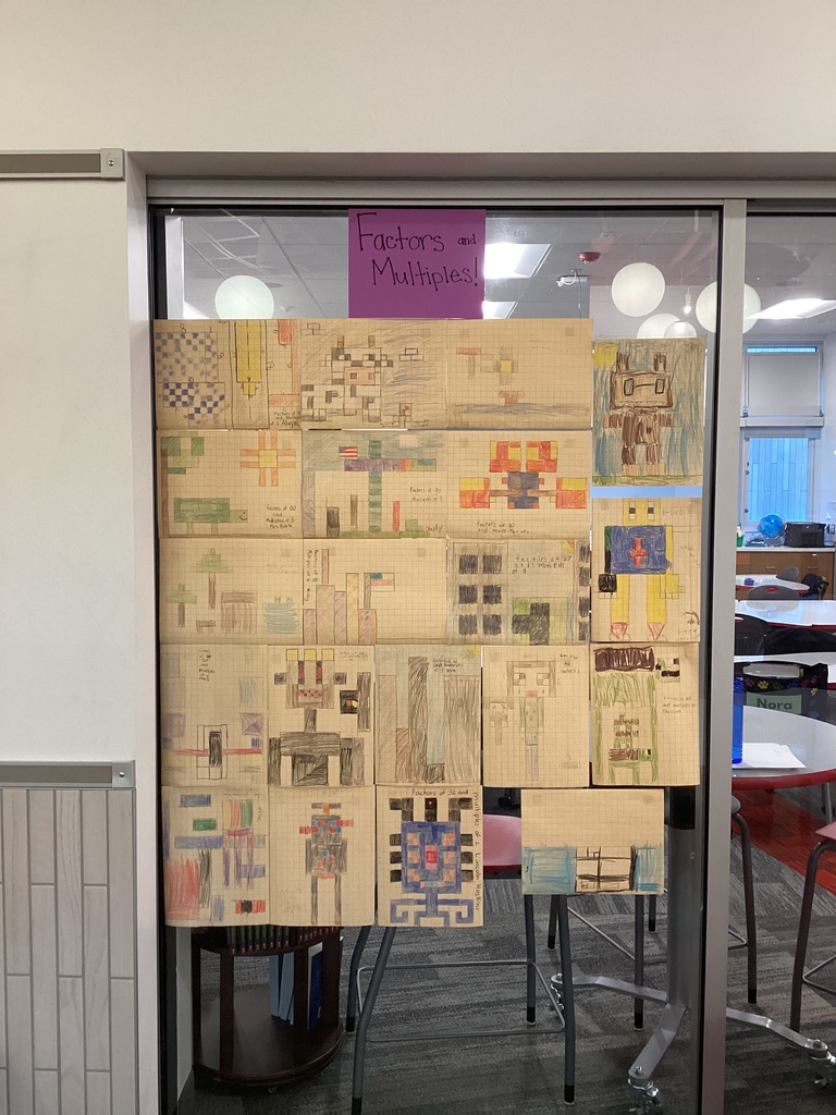 Student working hanging in a display.