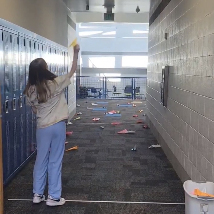 paper airplane flying