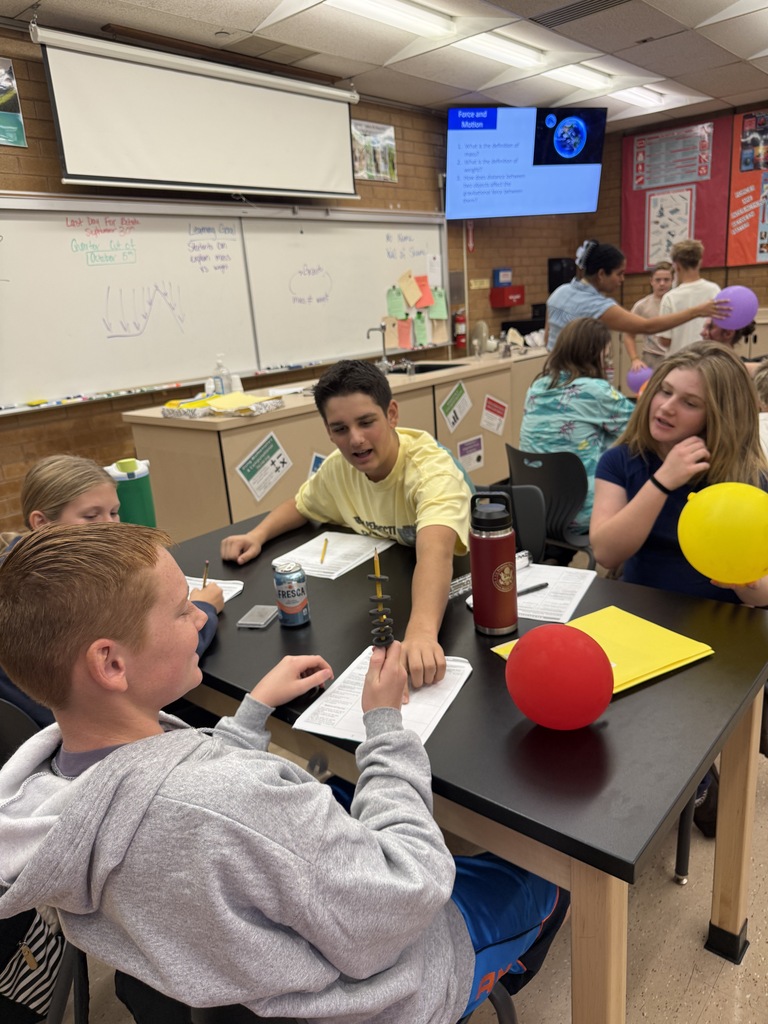 7th grade science class learning about magnetism.  