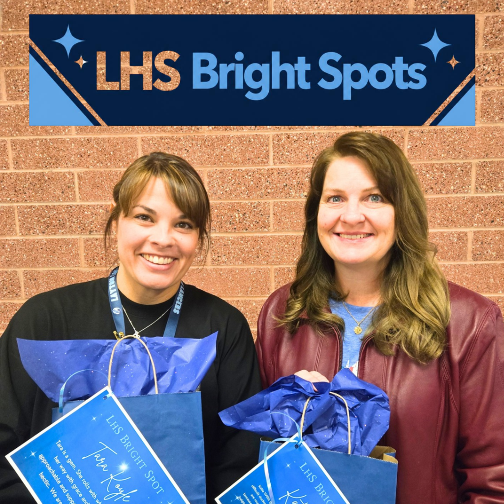 Mrs. Koyle and Mrs. Willis holding their Bright Spot awards