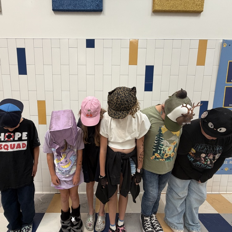 hats as a reminder to wear a bike helmet