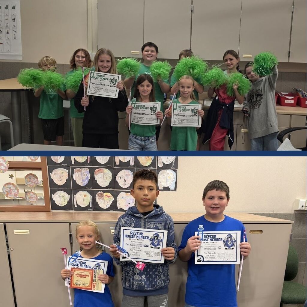 Students pose with certificates for being House Member of the Month.