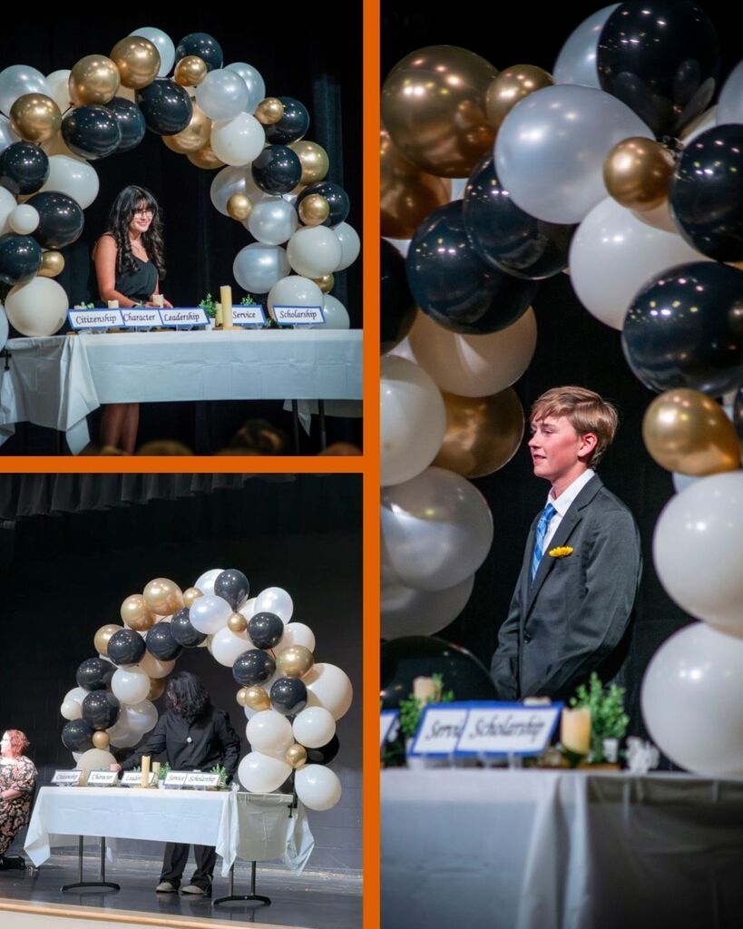 National Jr Honors Society students Lighting candles during the induction ceremony