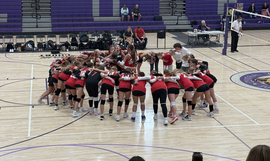 image of girls volleyball in a huddle