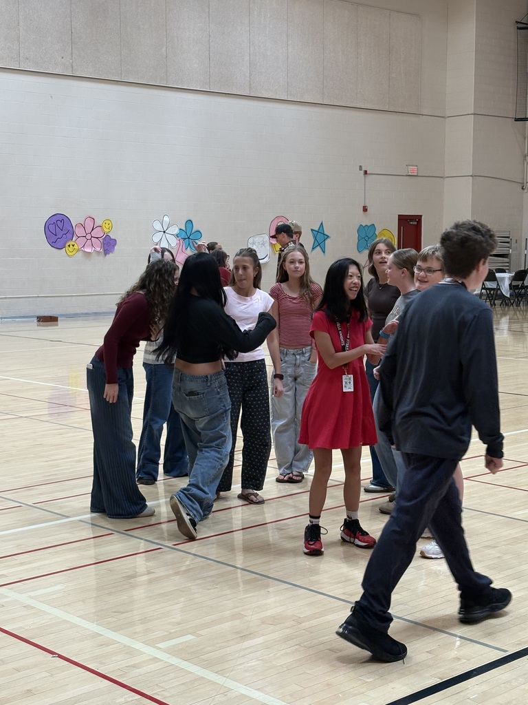 image of students standing on the dance floor