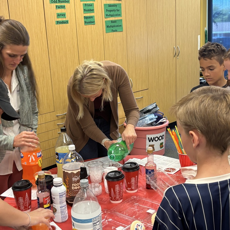 parent pouring soda drinks