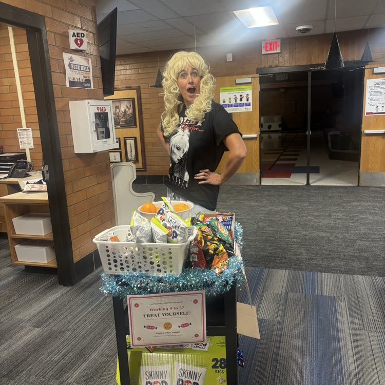 cart treat with women dressed as Dolly Parton 