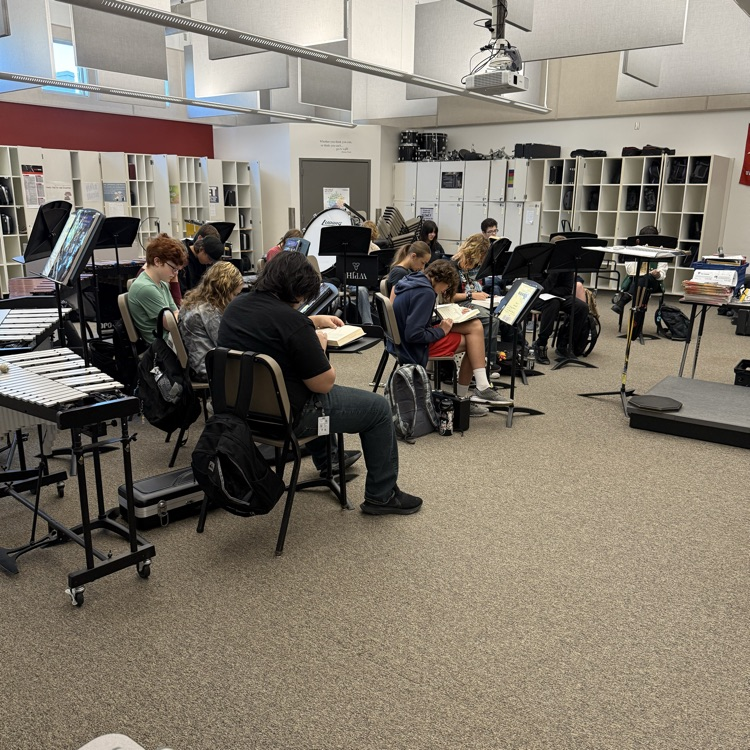 band students reading books