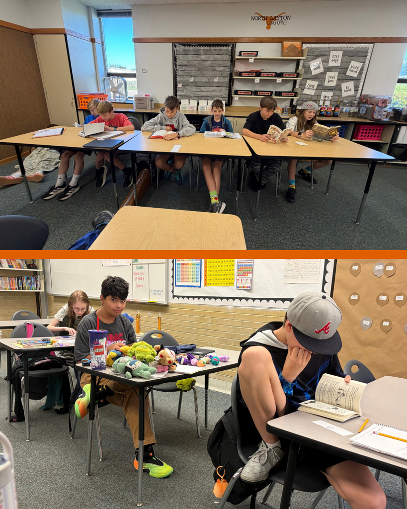 Students sitting at their desks reading during a read-a-thon