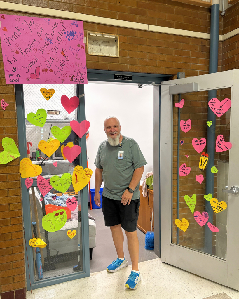 picture of Burton Elementary custodian with decorated door.