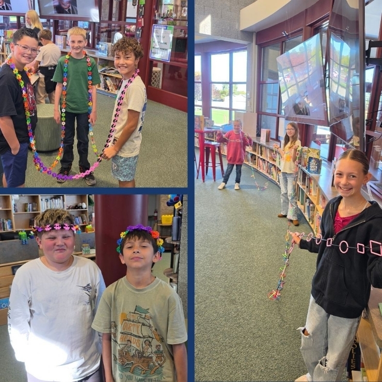 Students play with maker stations in the library.