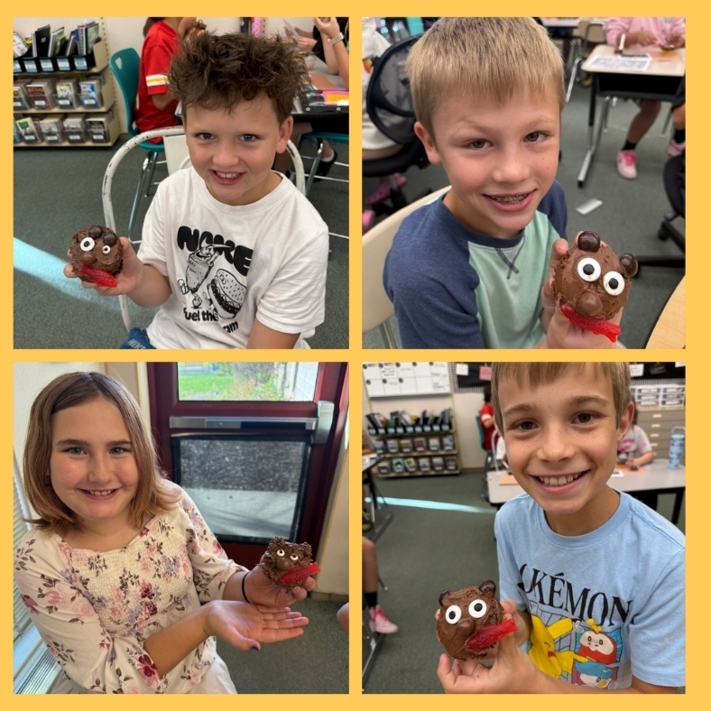 Students show off their bear cupcakes.