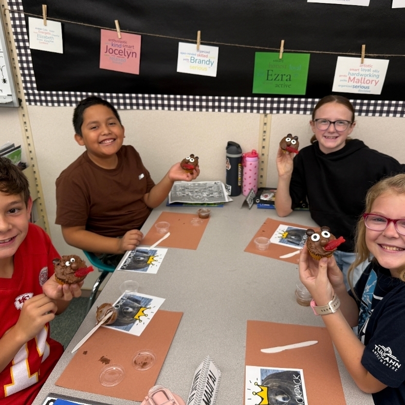Students show off their bear cupcakes.