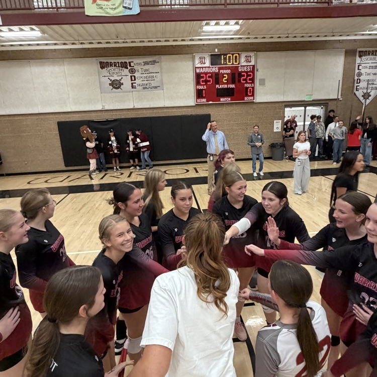 Team huddle after the win