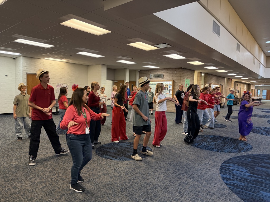 Students learning how to dance different Latin American dance styles in Mrs. Cifuentes’ class, while in the Commons. 