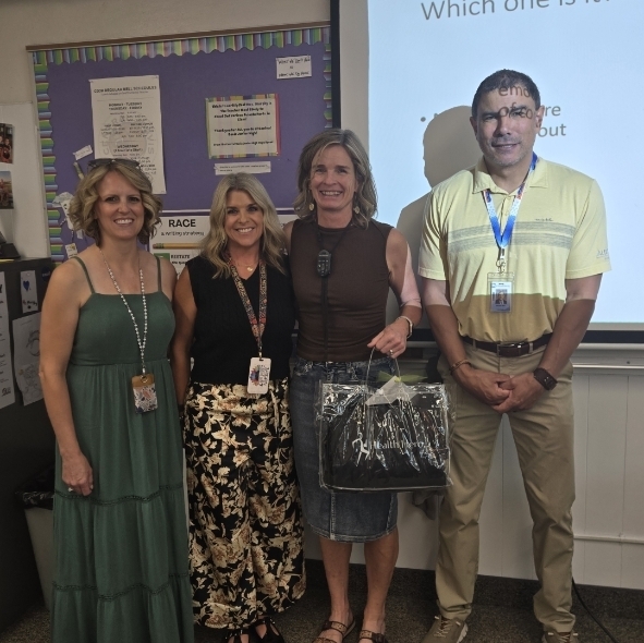 Patty Murphy with district personnel