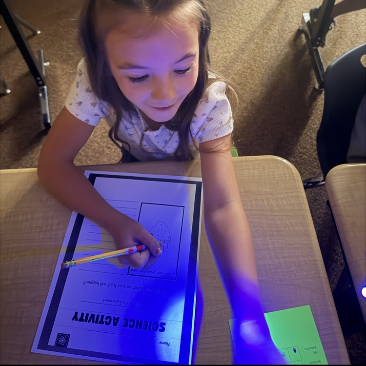 1st graders experimenting with germs, they got to use a blacklight to see their practice of spreading germs to learn the importance of hand washing