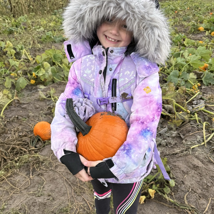 student smiling at field trip