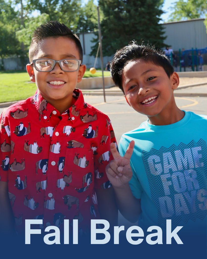 Fall Break. Students smiling at the camera. 