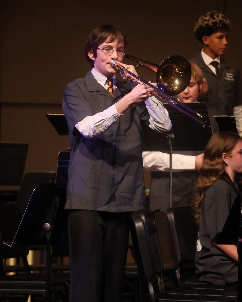 Student playing in the band