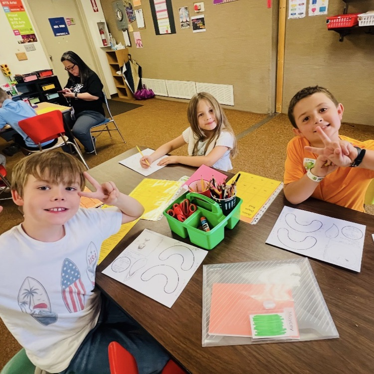 second graders doing an activity in their BTS class
