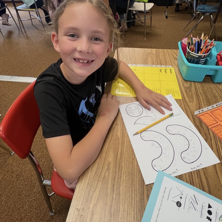 second graders doing an activity in their BTS class