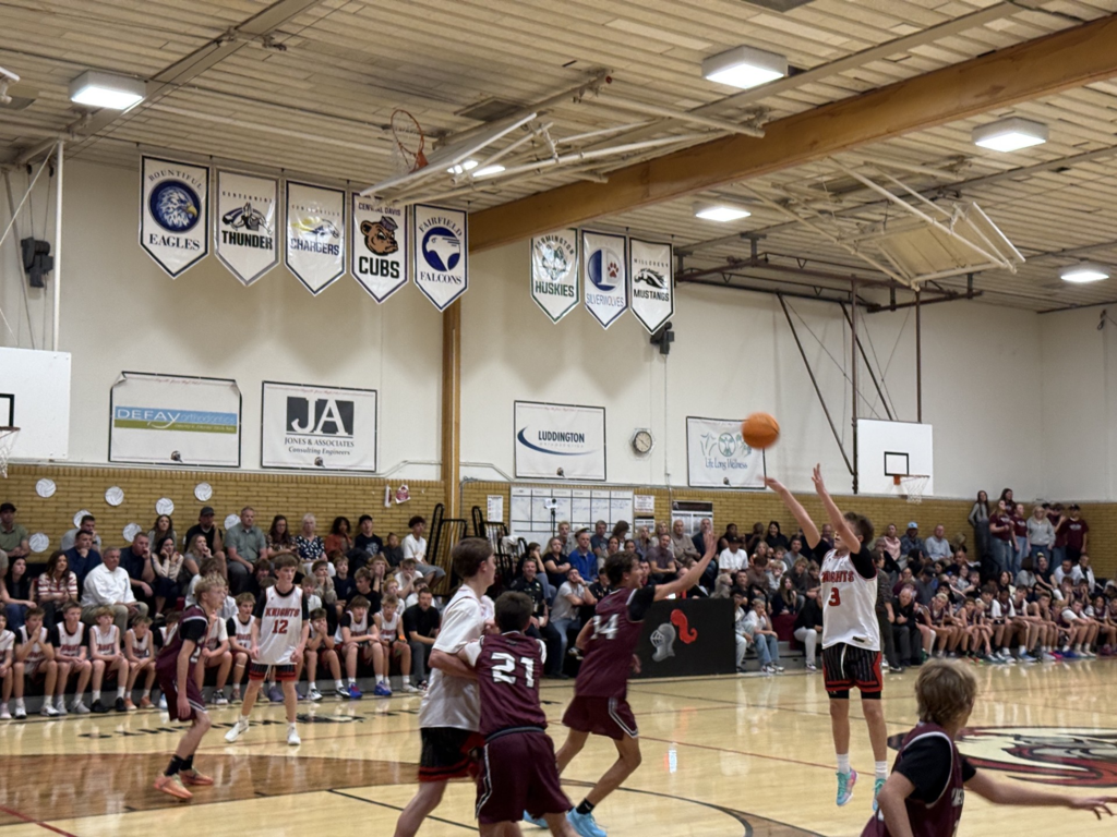 image of boys playing basketball