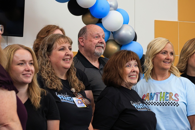 A group of people smiling.