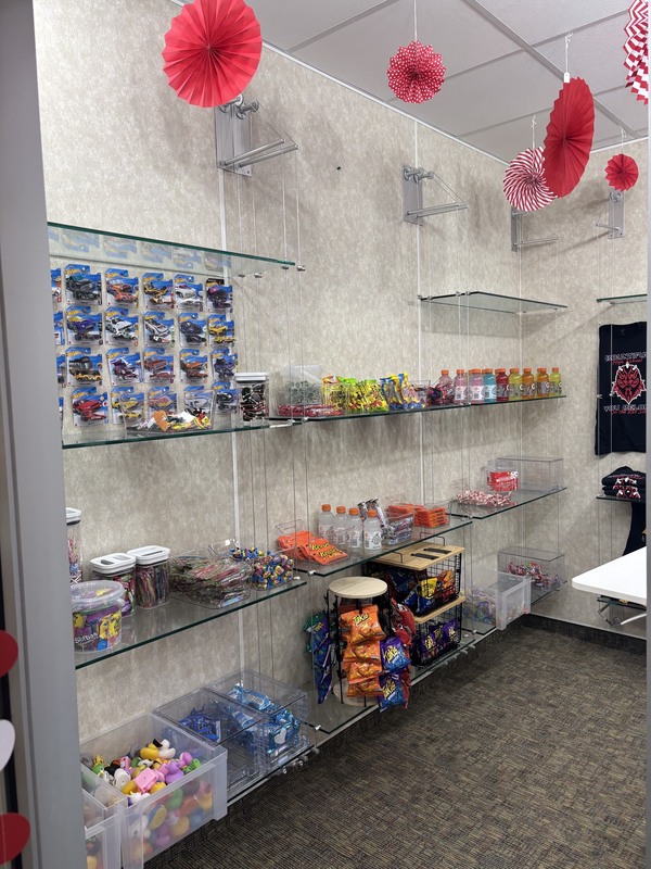 image of treats and cars on a shleving