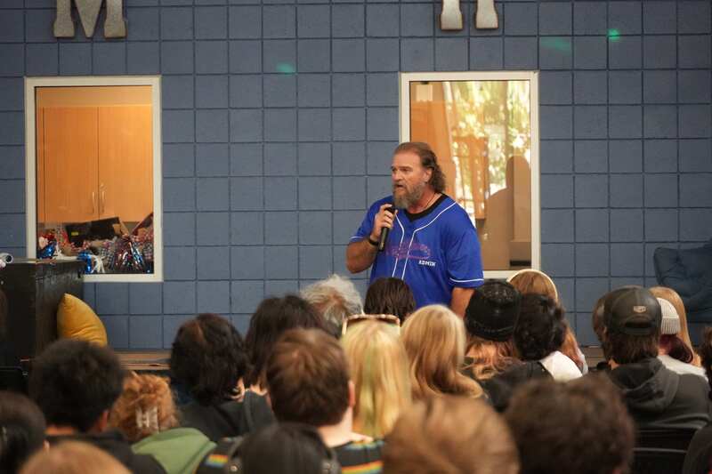 Assistant Adminitrator Shawn Johnson talking to Student Body