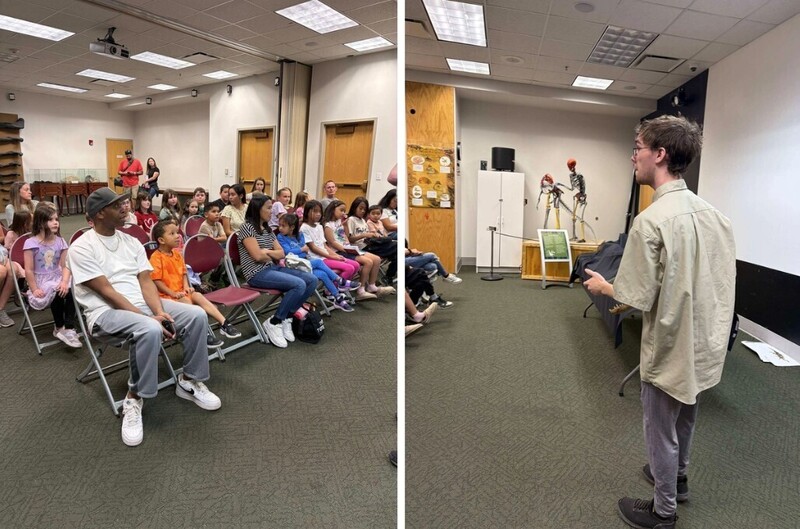 Students, teachers, and parents sit in a classroom and listen to a presentation on fossils.