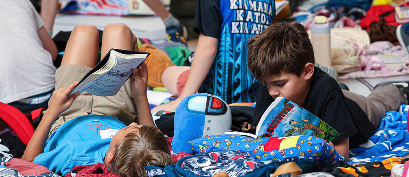 Students reading books at the Utah Reads Read-A-Thon at the Utah State Capitol