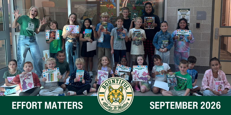 Bountiful Elementary's September 2026 Make It Matter Students pose together holding books and certificates after being recognized for demonstrating the schoolwide theme "effort matters"