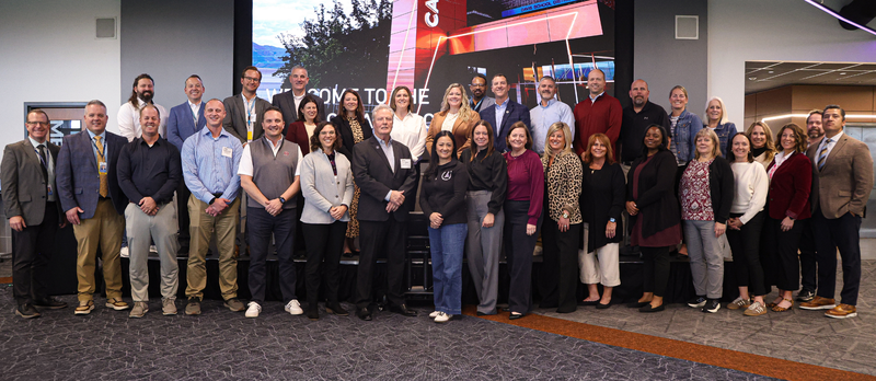 A group photo of AASA Innovation for Transformation Consortium members with Davis School District Administration.